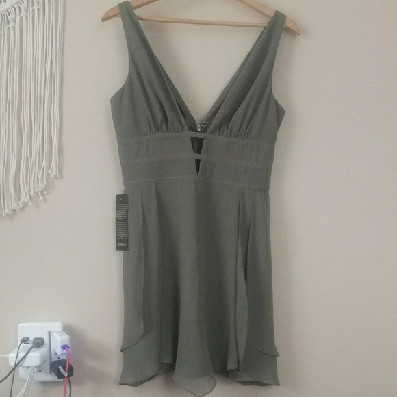 bebe Dresses & Skirts - NWT bebe deep v tulip skirt dress bebe Dresses & Skirts - NWT bebe deep v tulip skirt dress